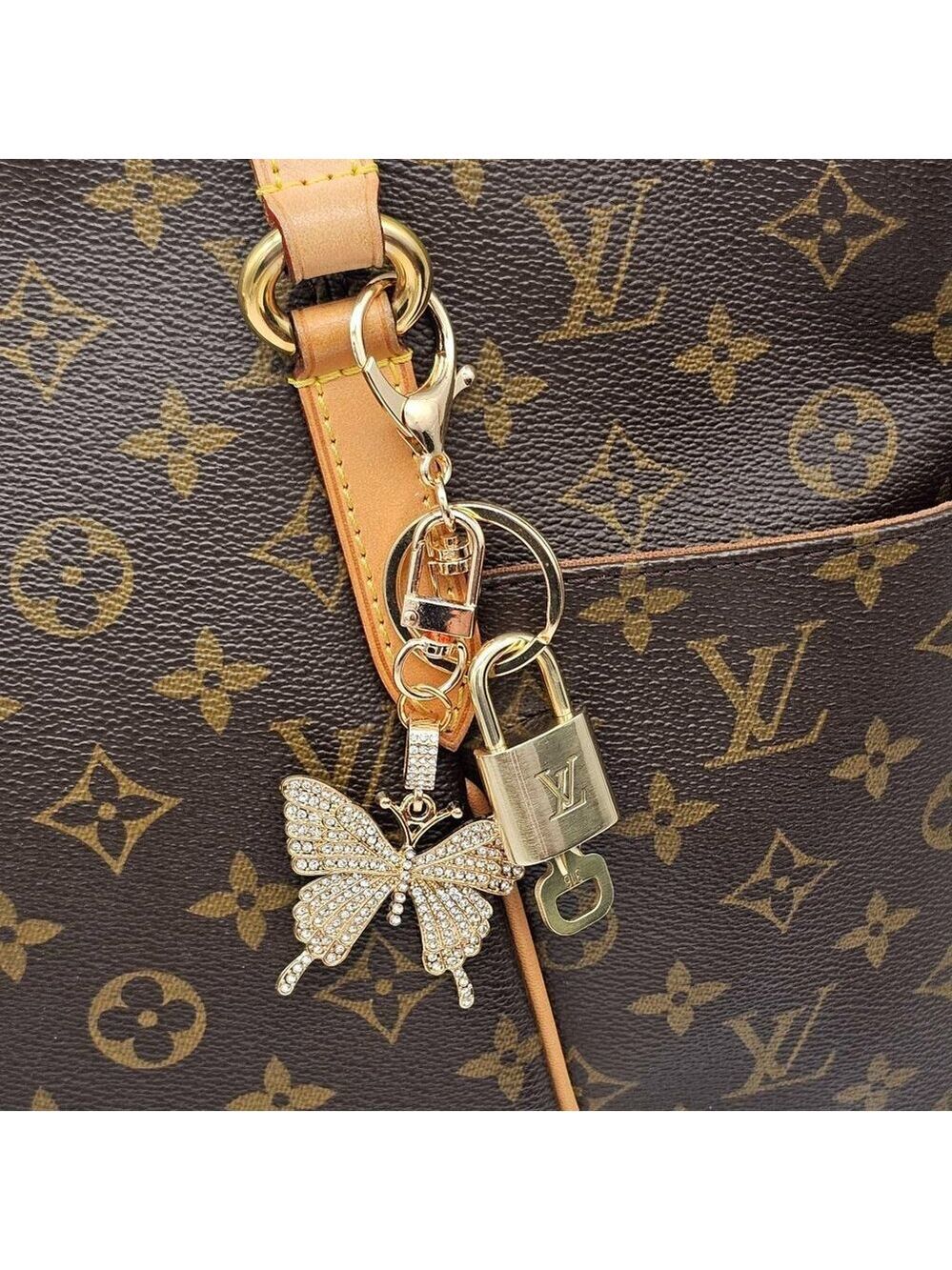 Louis Vuitton Authentic Gold Lock 🔒 Unbranded Butterfly Keychain for Bags